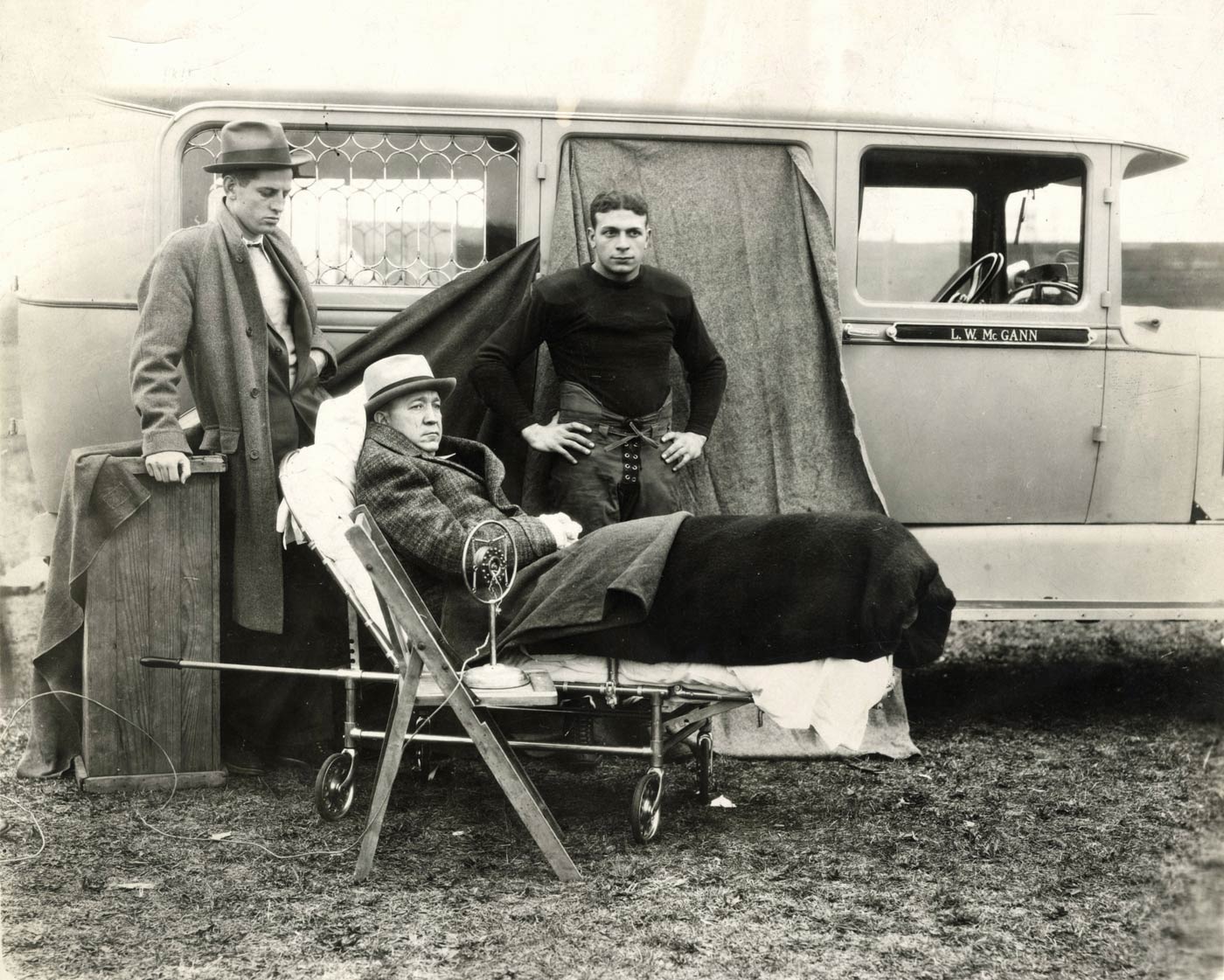 Directing Practice from the Sidelines Rockne directing practice while recovering from illness using a microphone