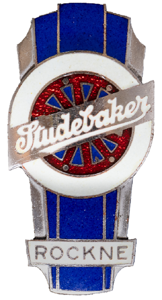 The Rockne Studebaker emblem used on the automobiles The art deco style Rockne emblem used on the Studebaker